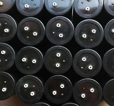 Capacitor sealing materials